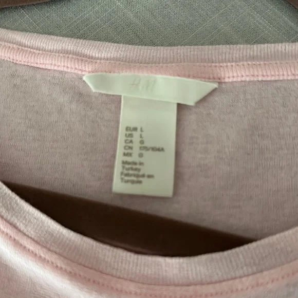 H&M flutter sleeve t-shirt in pink. Gently used. Runs big. Great summer piece. - Picture 3 of 6